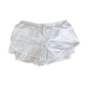 Athletic women’s white shirt with spandex underneath size M